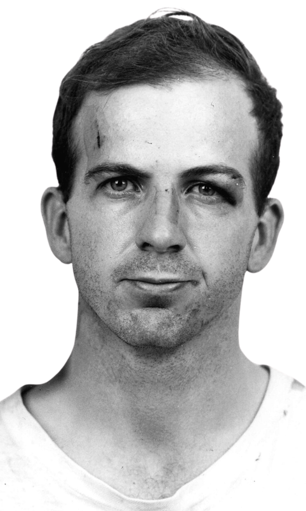Black and white mugshot photograph of Lee Harvey Oswald